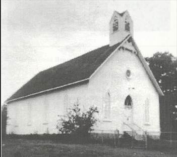A white church with a bell tower

AI-generated content may be incorrect.